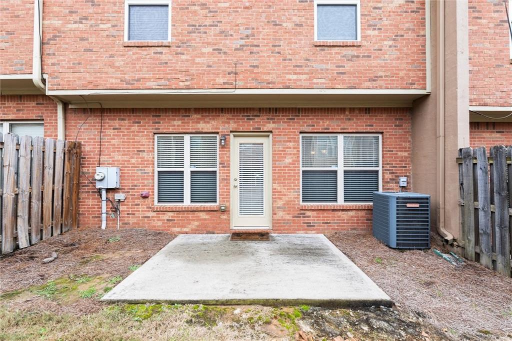 1207 Mistyhaynes Way Grayson, GA 30017 - Photo 35 of 37 a front view of a house with many windows