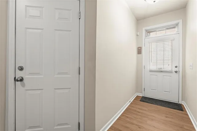 a view of a livingroom with wooden floor