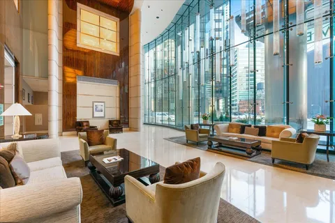 a view of a kitchen with lots of counter top space