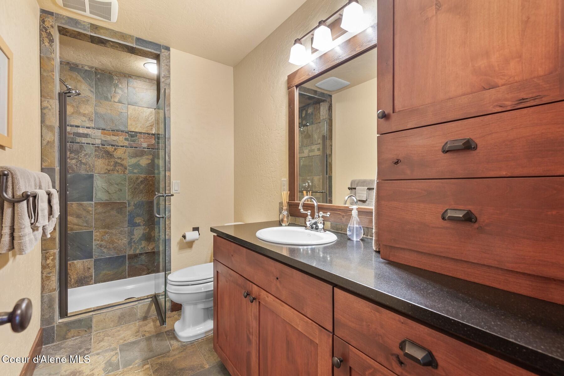 4456 East Eagles Mere Road Harrison, ID 83833 - Photo 35 of 64 Upstairs Hallway Bathroom