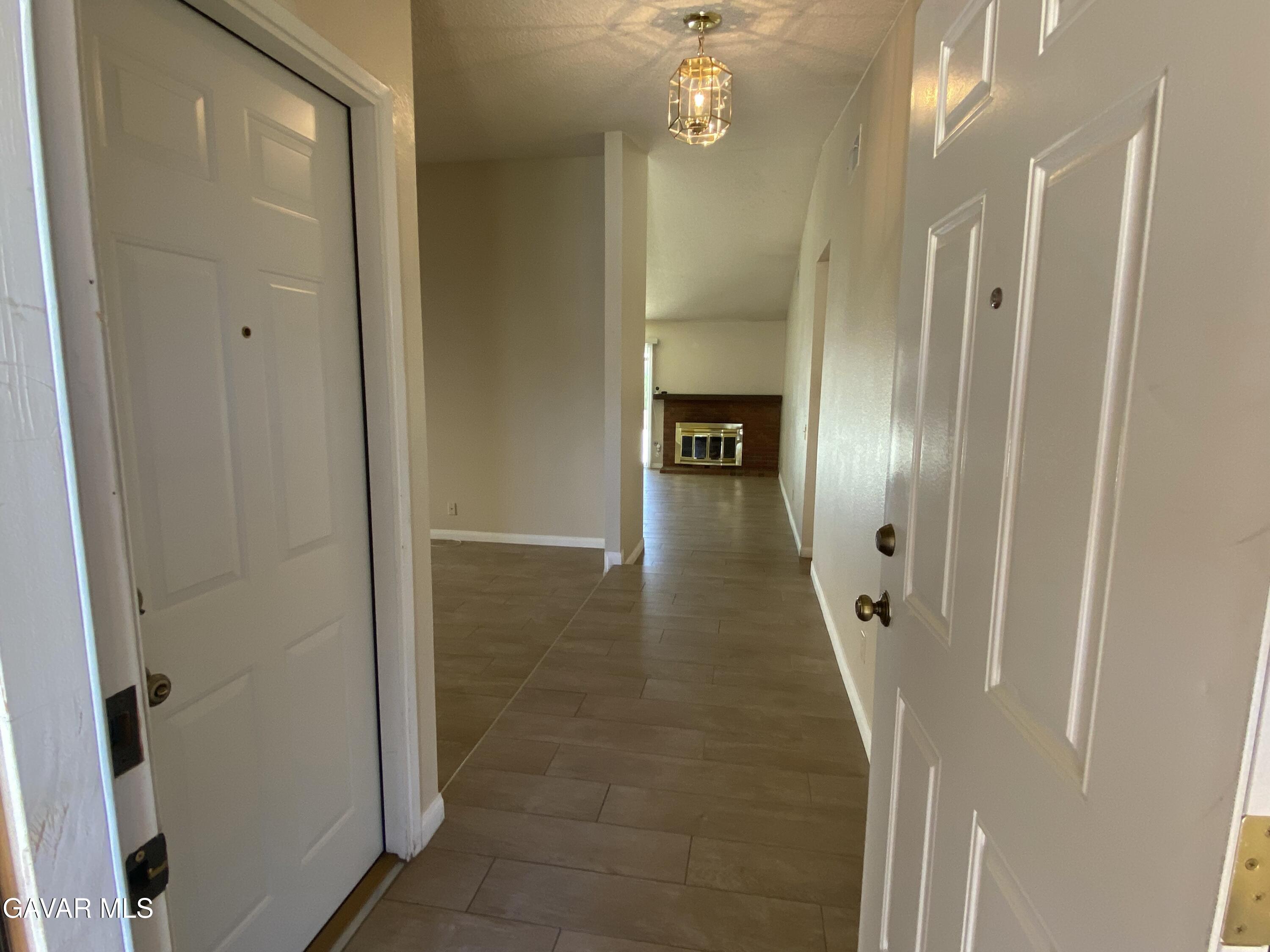 44034 4th Street East Lancaster, CA 93535 - Photo 2 of 14 a view of a hallway with a elevator