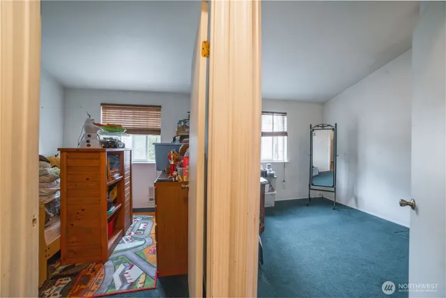 a view of walk in closet with window