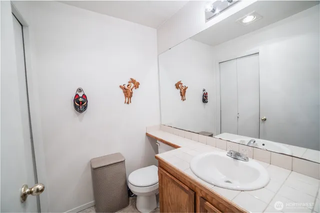 a bathroom with a sink and a toilet