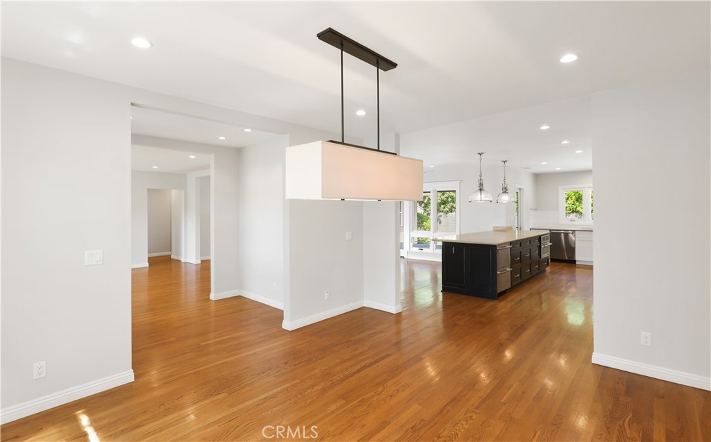 933 West Riviera Drive Santa Ana, CA 92706 - Photo 12 of 43 a view of kitchen with furniture and wooden floor