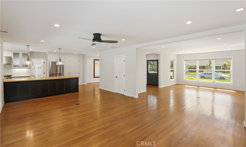 933 West Riviera Drive Santa Ana, CA 92706 - Photo 17 of 43 a view of an empty room with kitchen and window