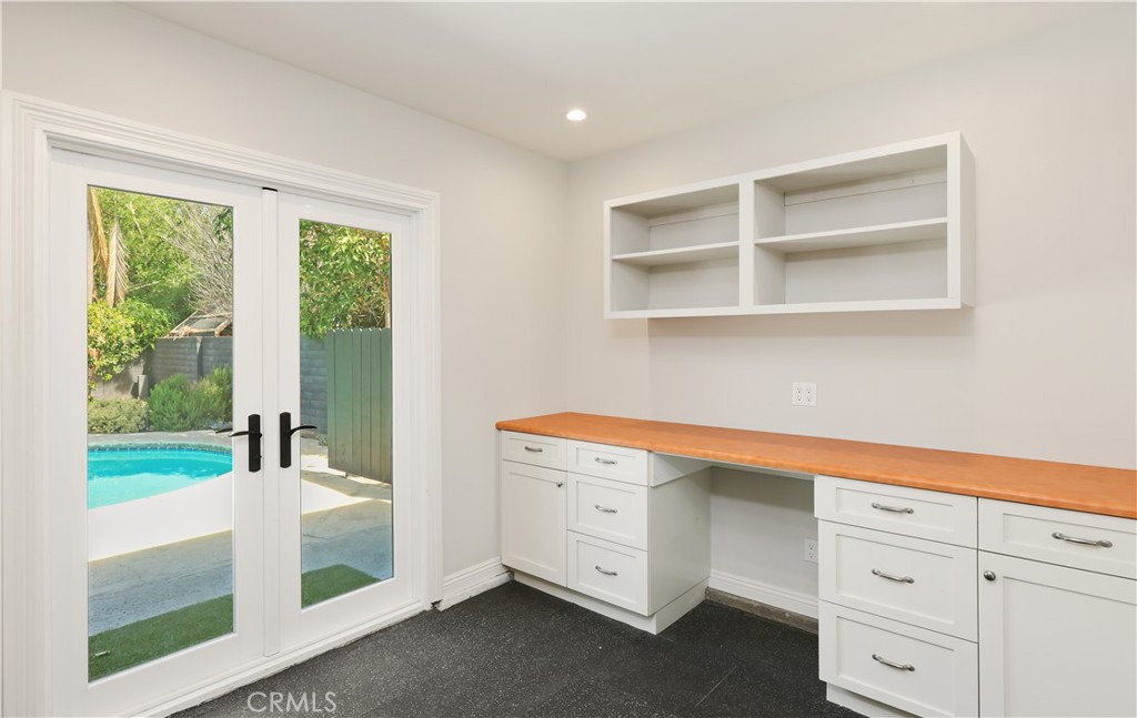 933 West Riviera Drive Santa Ana, CA 92706 - Photo 25 of 43 a kitchen with a cabinets and white appliances