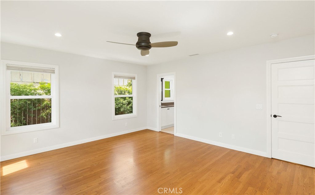 933 West Riviera Drive Santa Ana, CA 92706 - Photo 29 of 43 an empty room with a window and a ceiling fan