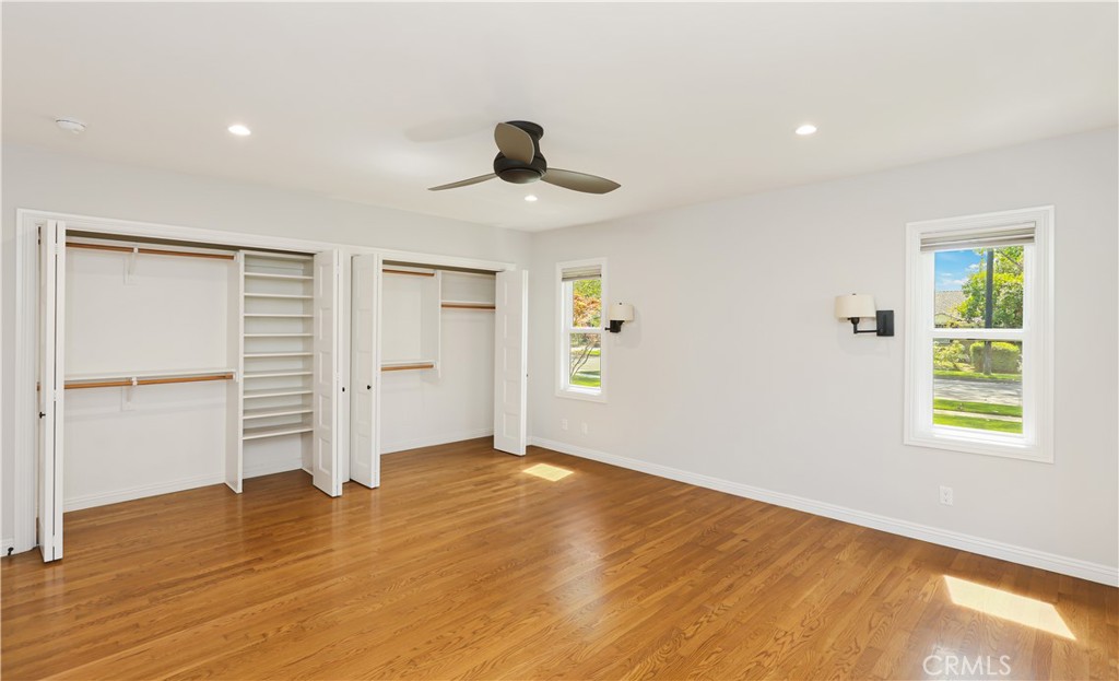 933 West Riviera Drive Santa Ana, CA 92706 - Photo 31 of 43 a view of an empty room with wooden floor and a window