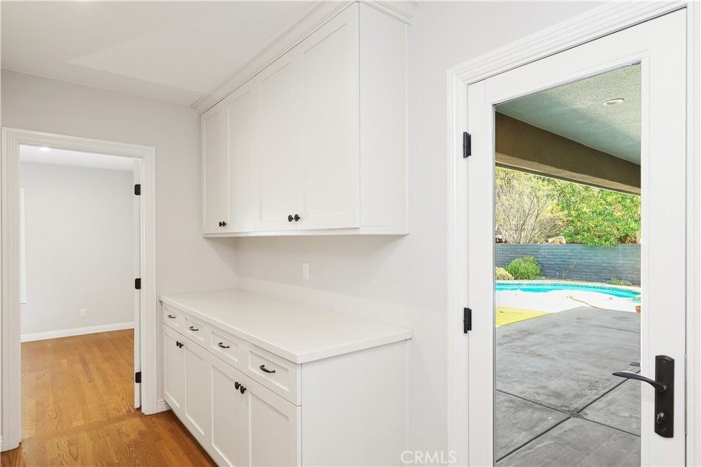 933 West Riviera Drive Santa Ana, CA 92706 - Photo 35 of 43 a view of an entryway with wooden floor