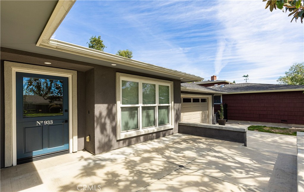 933 West Riviera Drive Santa Ana, CA 92706 - Photo 5 of 43 a view of a porch with a fireplace