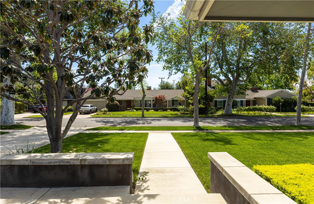 933 West Riviera Drive Santa Ana, CA 92706 - Photo 6 of 43 a view of swimming pool with a bench