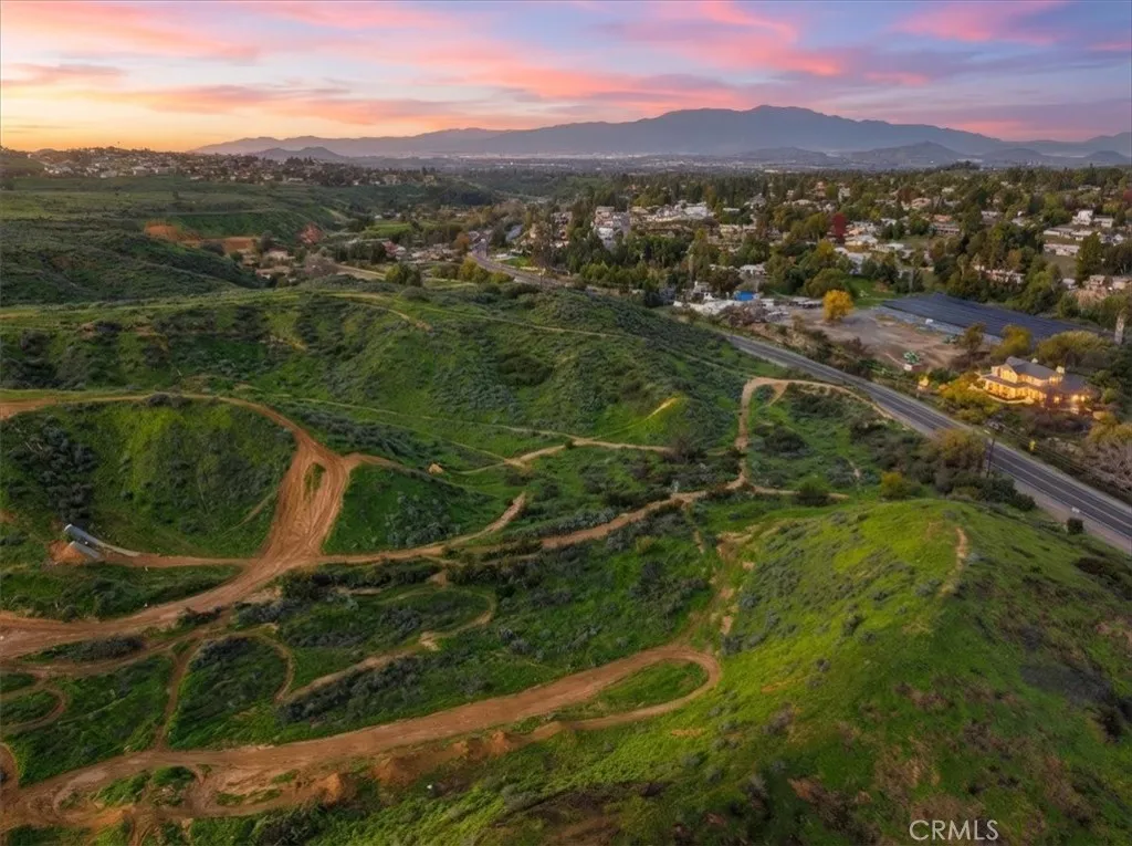 0 Sunrise Mesa Riverside, CA 92504 - Photo 1 of 11 a view of a city with mountains in the background