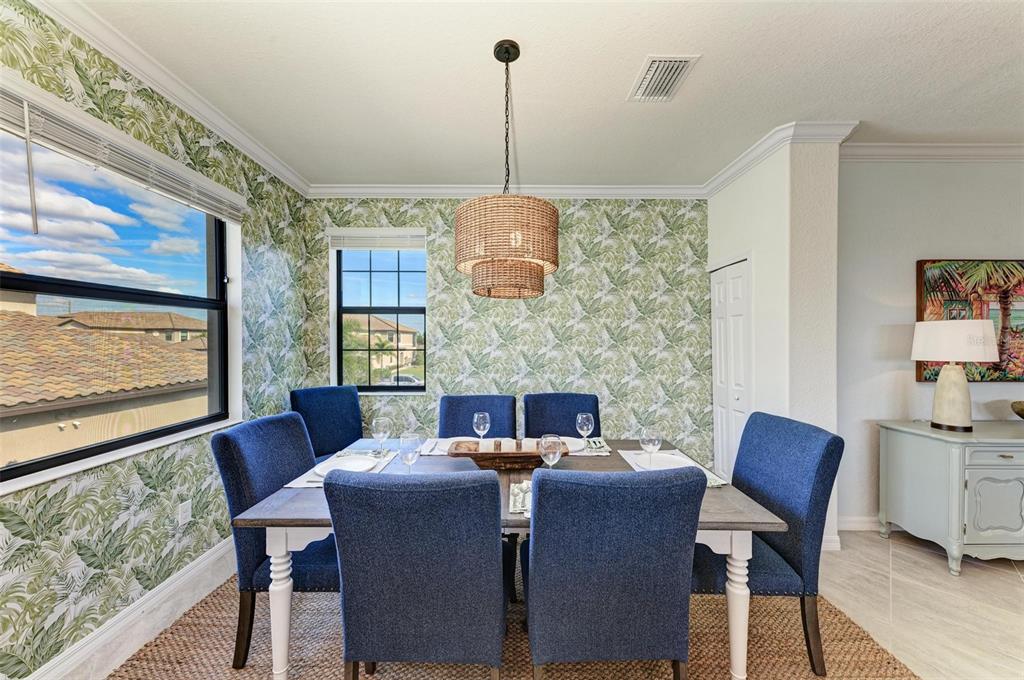 6086 Worsham Lane, Unit 103 Bradenton, FL 34211 - Photo 17 of 60 a view of a dining room with furniture window and outside view