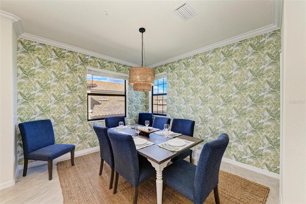 6086 Worsham Lane, Unit 103 Bradenton, FL 34211 - Photo 18 of 60 a view of a dining room with furniture window and outside view