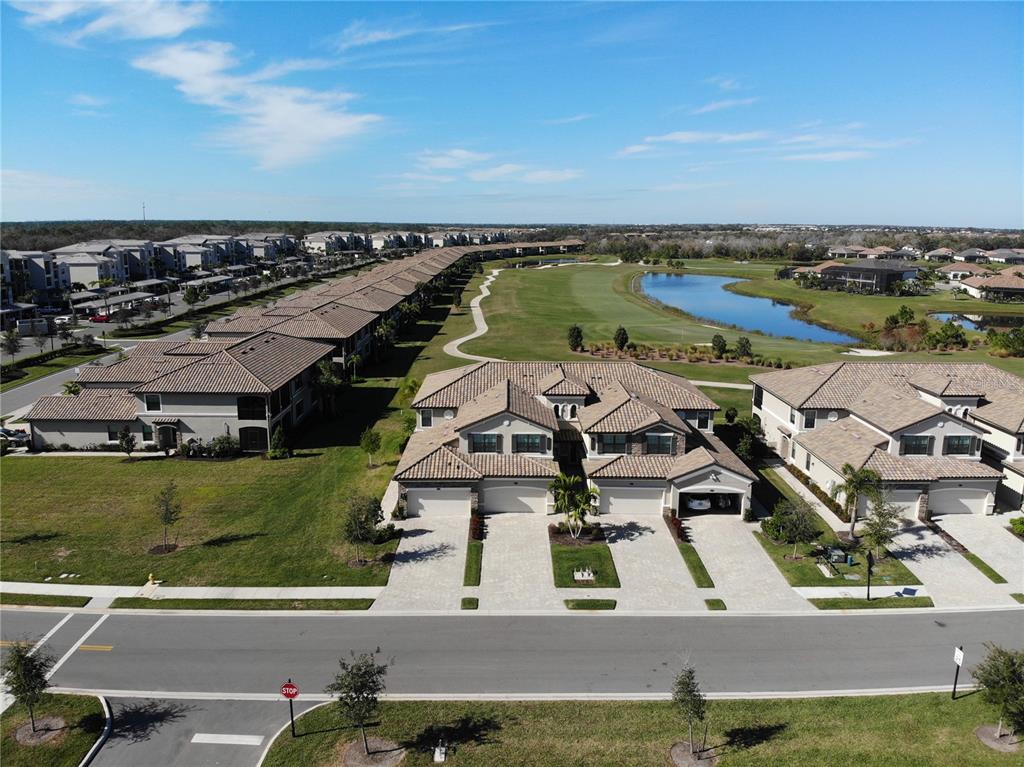 6086 Worsham Lane, Unit 103 Bradenton, FL 34211 - Photo 2 of 60 an aerial view of a house with a ocean view
