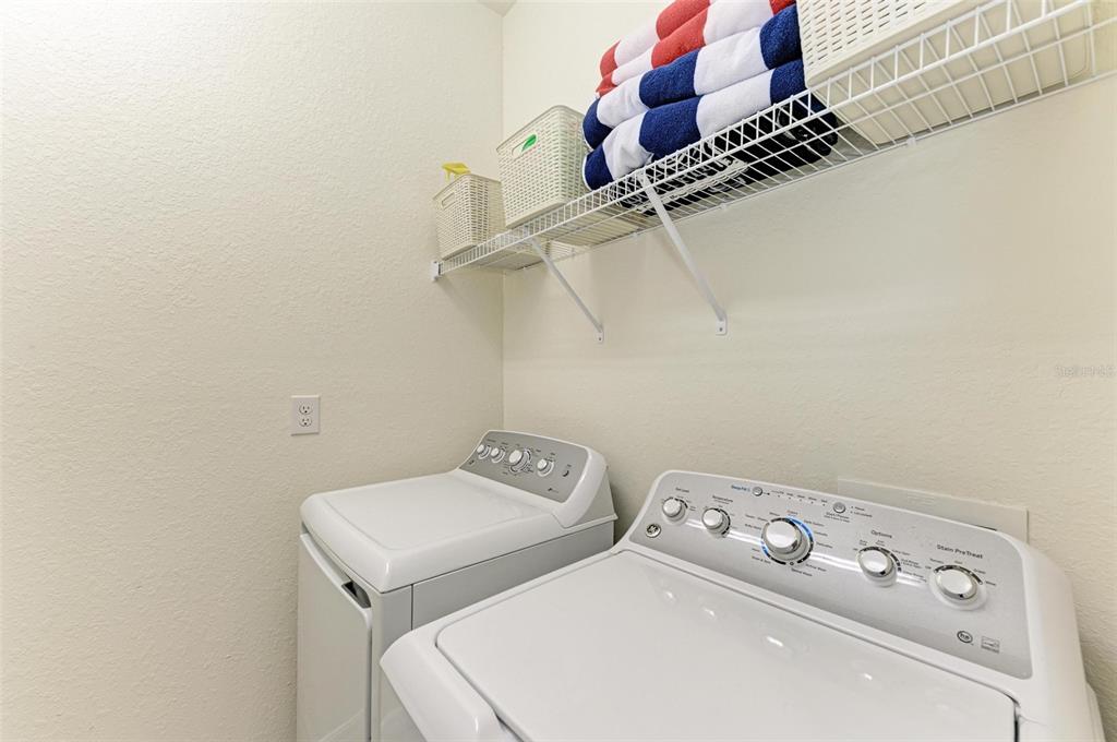 6086 Worsham Lane, Unit 103 Bradenton, FL 34211 - Photo 30 of 60 a utility room with dryer and washer