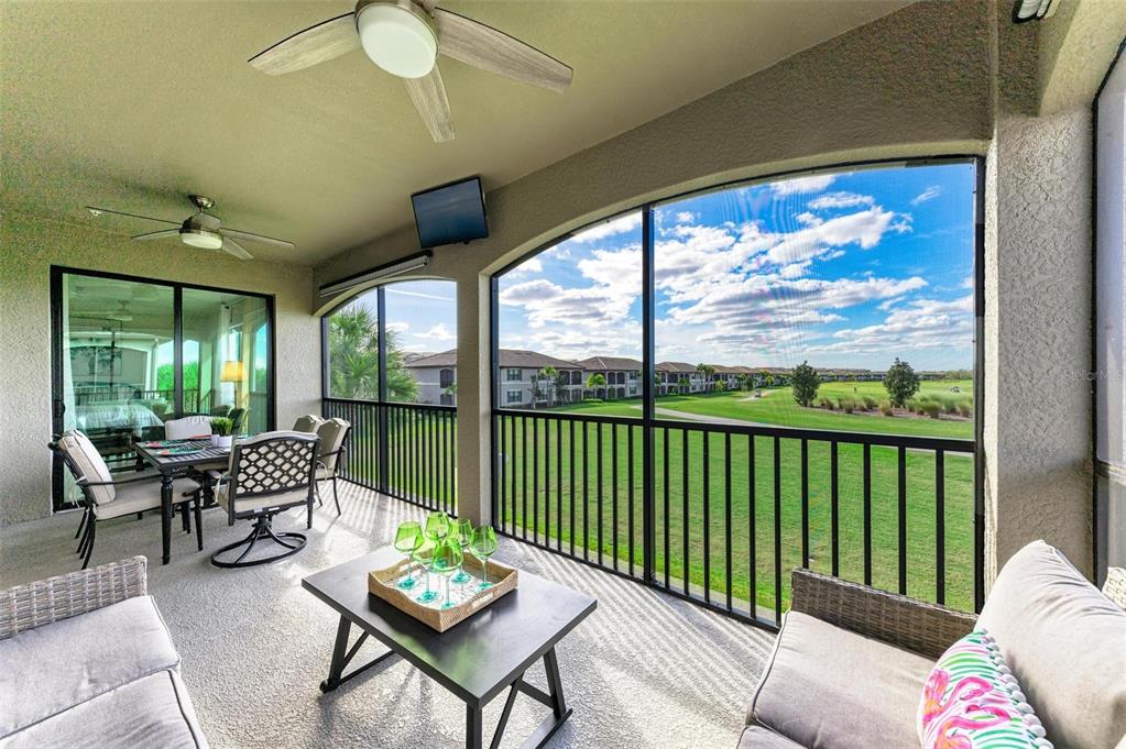 6086 Worsham Lane, Unit 103 Bradenton, FL 34211 - Photo 34 of 60 a living room with furniture and a large window