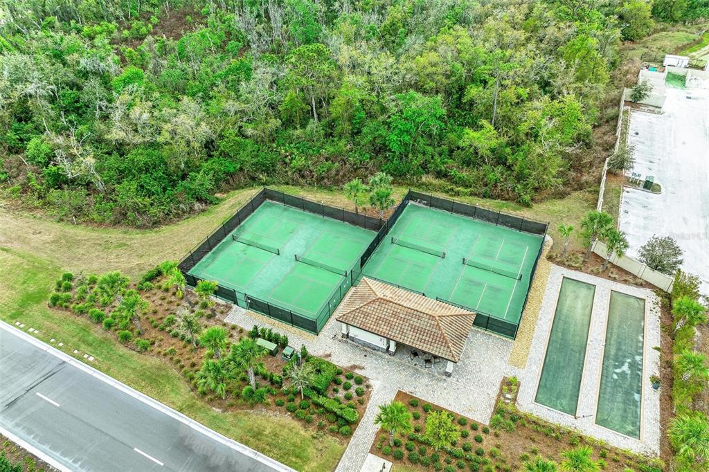 6086 Worsham Lane, Unit 103 Bradenton, FL 34211 - Photo 50 of 60 a backyard of a house with lots of green space