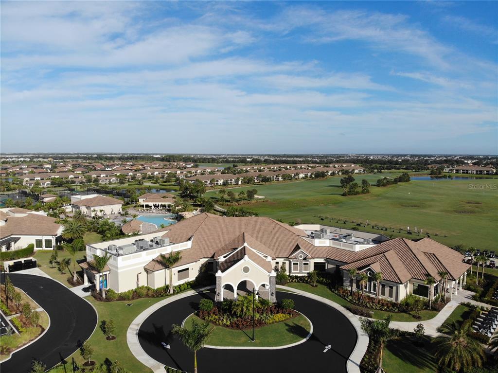 6086 Worsham Lane, Unit 103 Bradenton, FL 34211 - Photo 52 of 60 an aerial view of a house with outdoor space