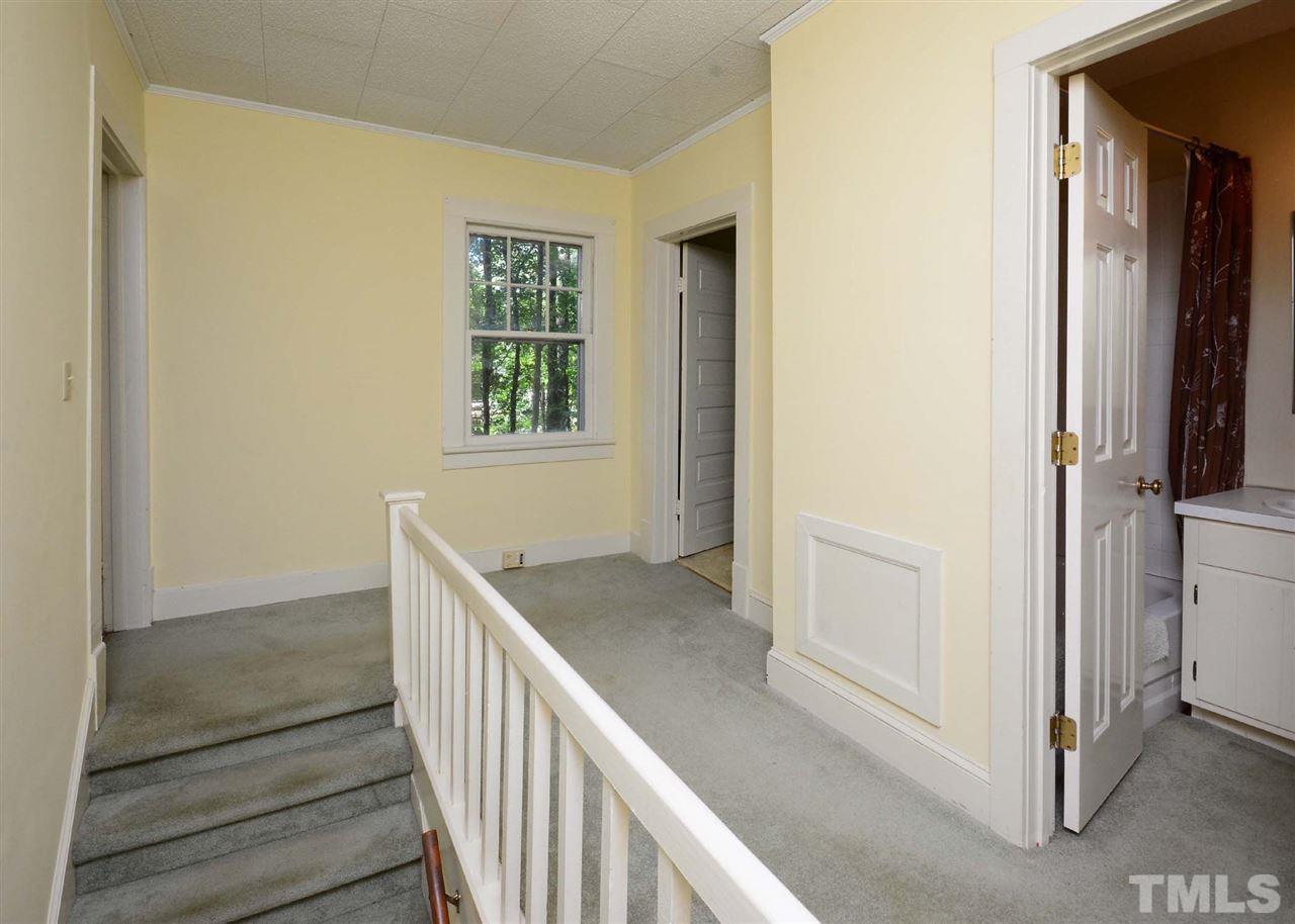 2114 Bahama Road Bahama, NC 27503 - Photo 20 of 21 a view of entryway with wooden floor and stairs