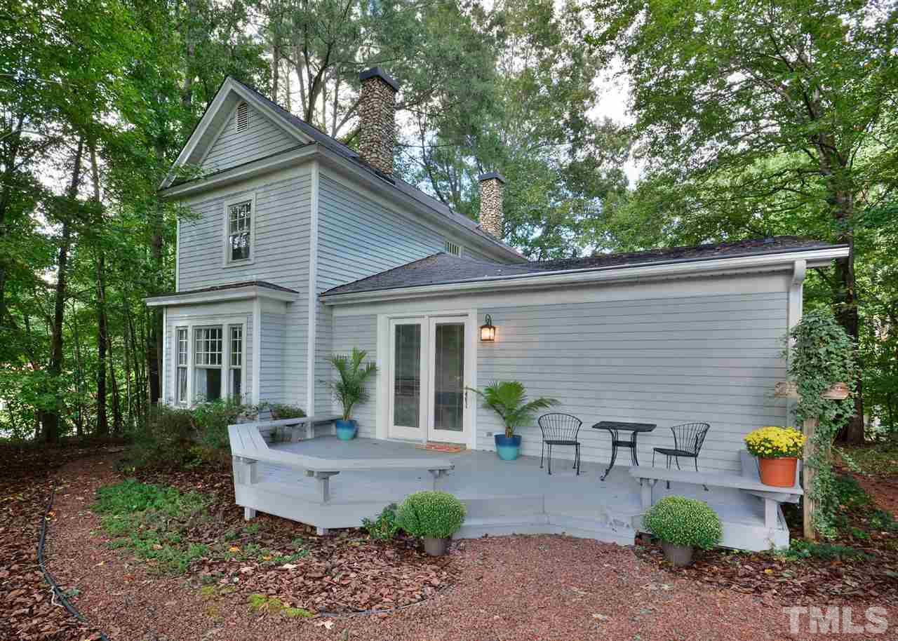 2114 Bahama Road Bahama, NC 27503 - Photo 21 of 21 a front view of a house with patio