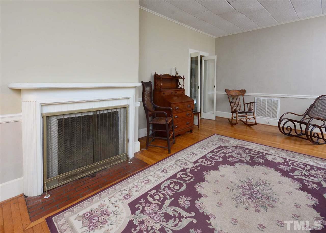 2114 Bahama Road Bahama, NC 27503 - Photo 7 of 21 a living room with furniture and a fireplace