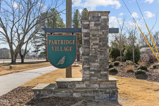 a view of a parking space in front of a building