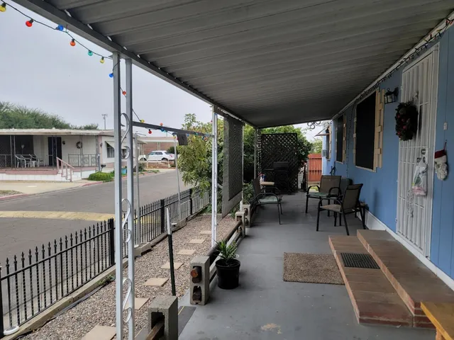 a view of a porch with furniture