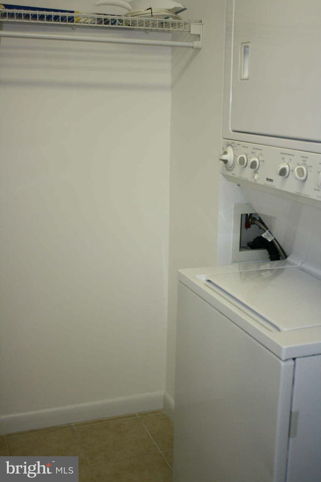 851 North Glebe Road, Unit 912 Arlington, VA 22203 - Photo 13 of 21 a utility room with dryer and washer