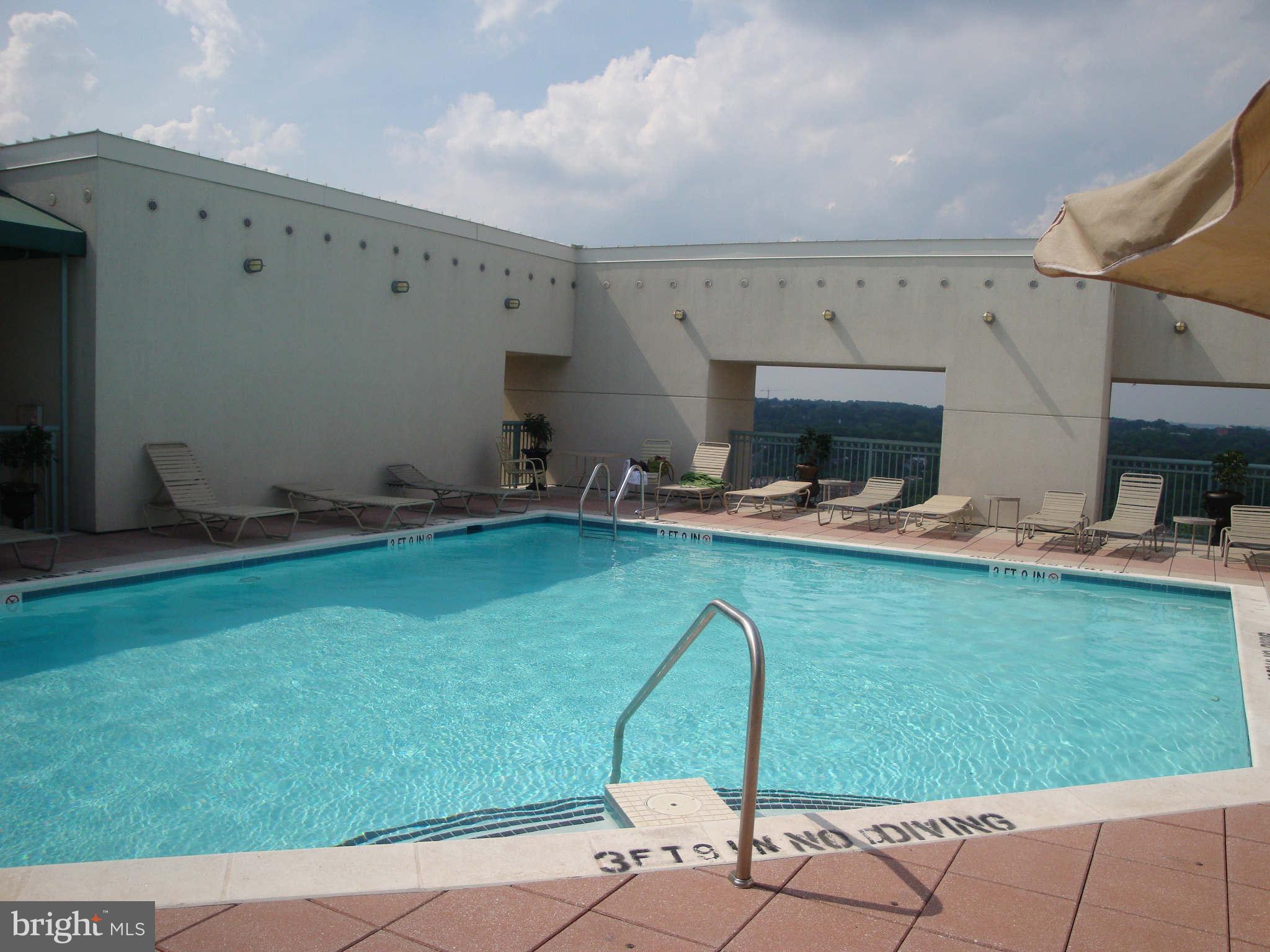 851 North Glebe Road, Unit 912 Arlington, VA 22203 - Photo 14 of 21 a room with pool table and chairs