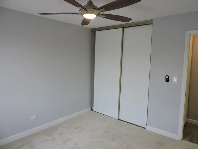 en empty room with fan
