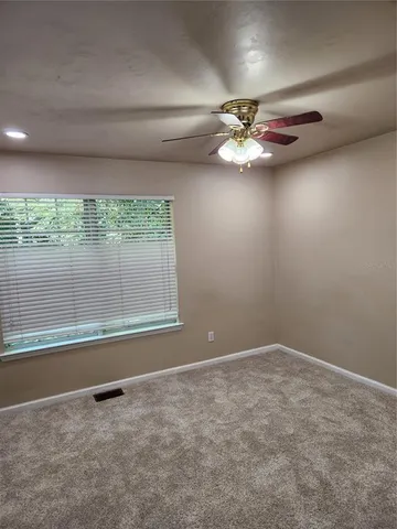 an empty room with a bathroom