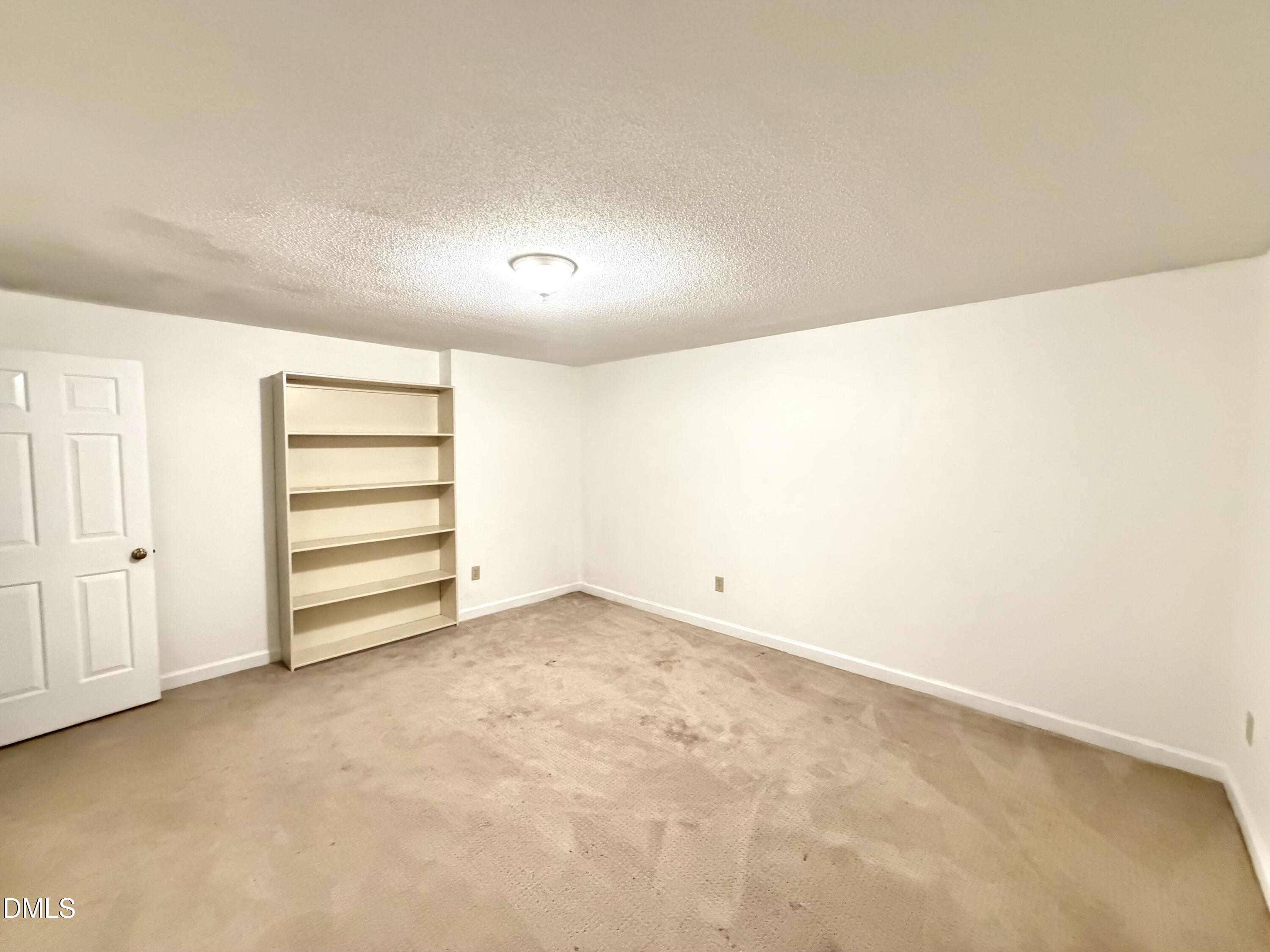 4907 Fortunes Ridge Drive Durham, NC 27713 - Photo 35 of 43 a view of room and garage