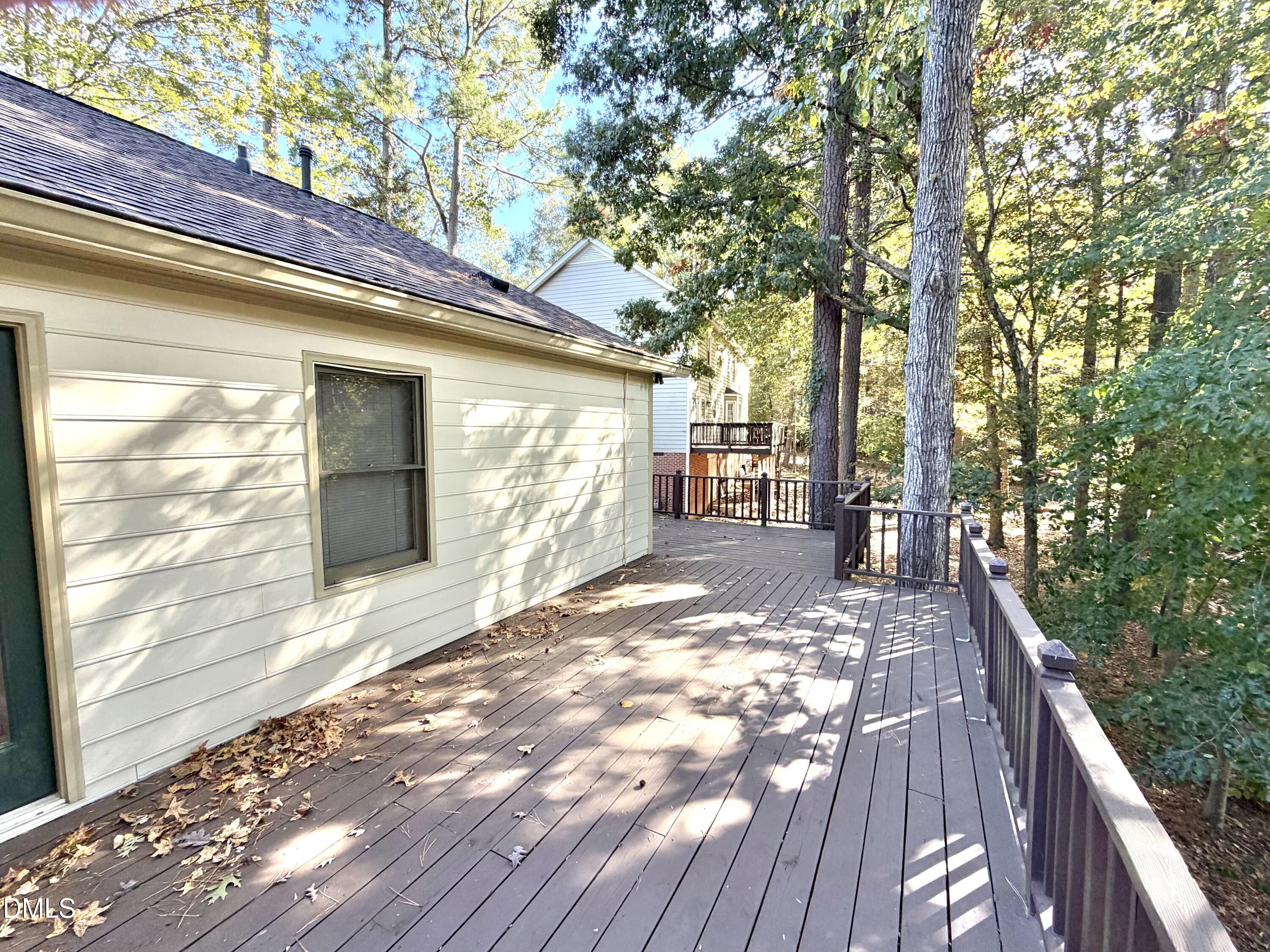 4907 Fortunes Ridge Drive Durham, NC 27713 - Photo 38 of 43 a view of outdoor space with deck and backyard
