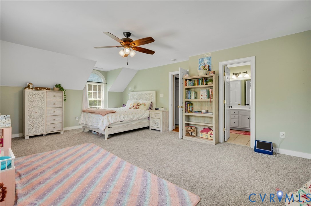 3090 Poor House Road Goochland, VA 23063 - Photo 17 of 32 Spacious room featuring vaulted ceilings, a promin