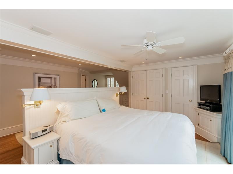 22 Indian Spring Road Rowayton, CT 06853 - Photo 13 of 23 a large white bed in a white room
