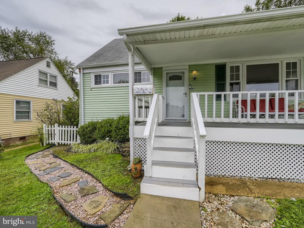 813 Cliffedge Road Pikesville, MD 21208 - Photo 3 of 31 Front porch with gate at top of stairs