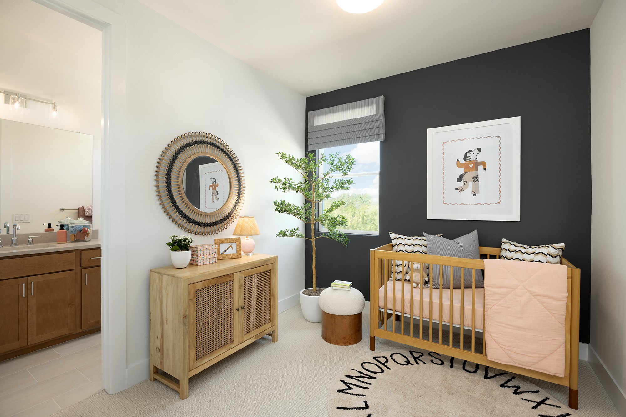 1309 Sweet Bark Street Austin, TX 78745 - Photo 12 of 14 a room with a baby crib furniture and a window