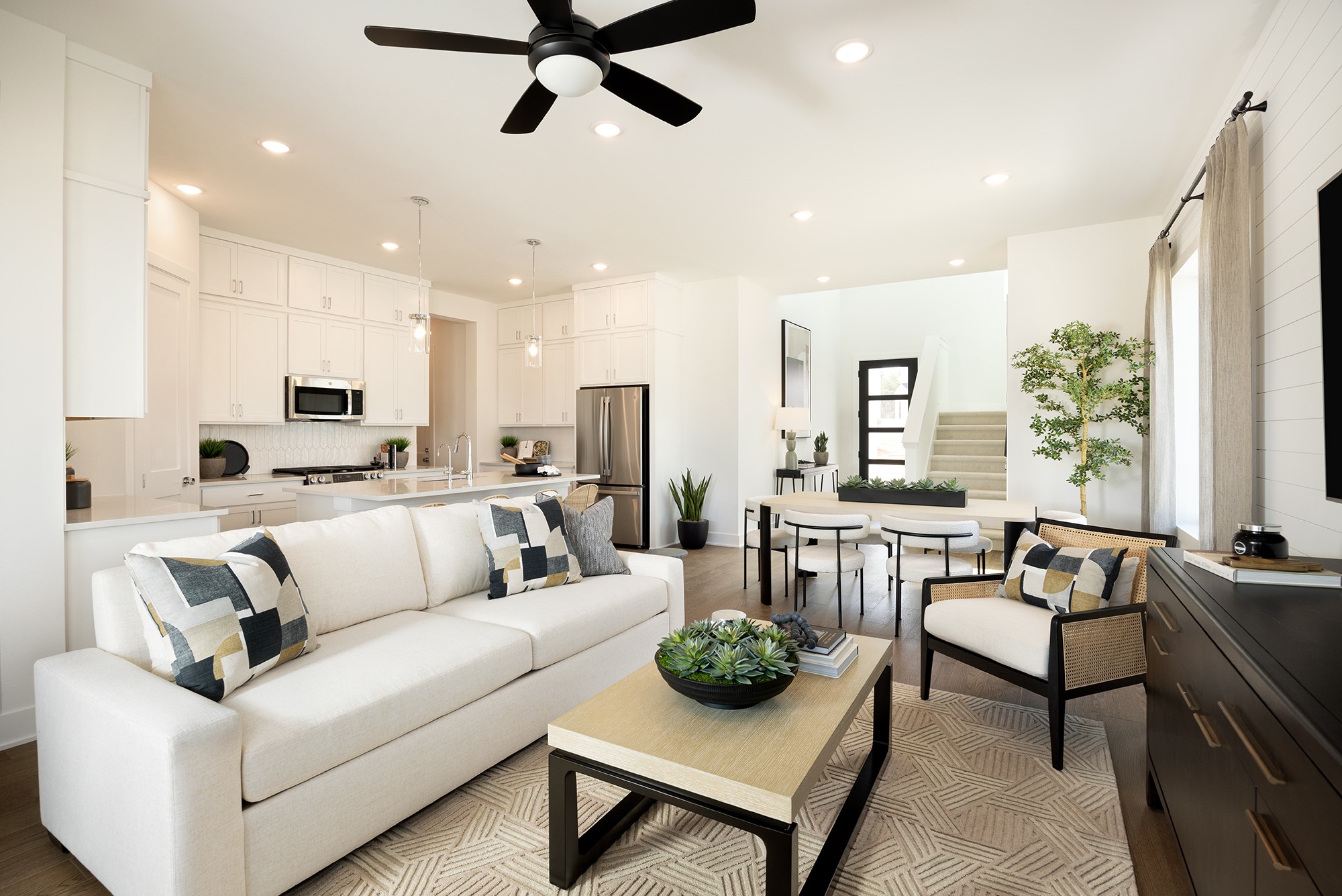 1309 Sweet Bark Street Austin, TX 78745 - Photo 10 of 14 a view of a livingroom with furniture and a large window