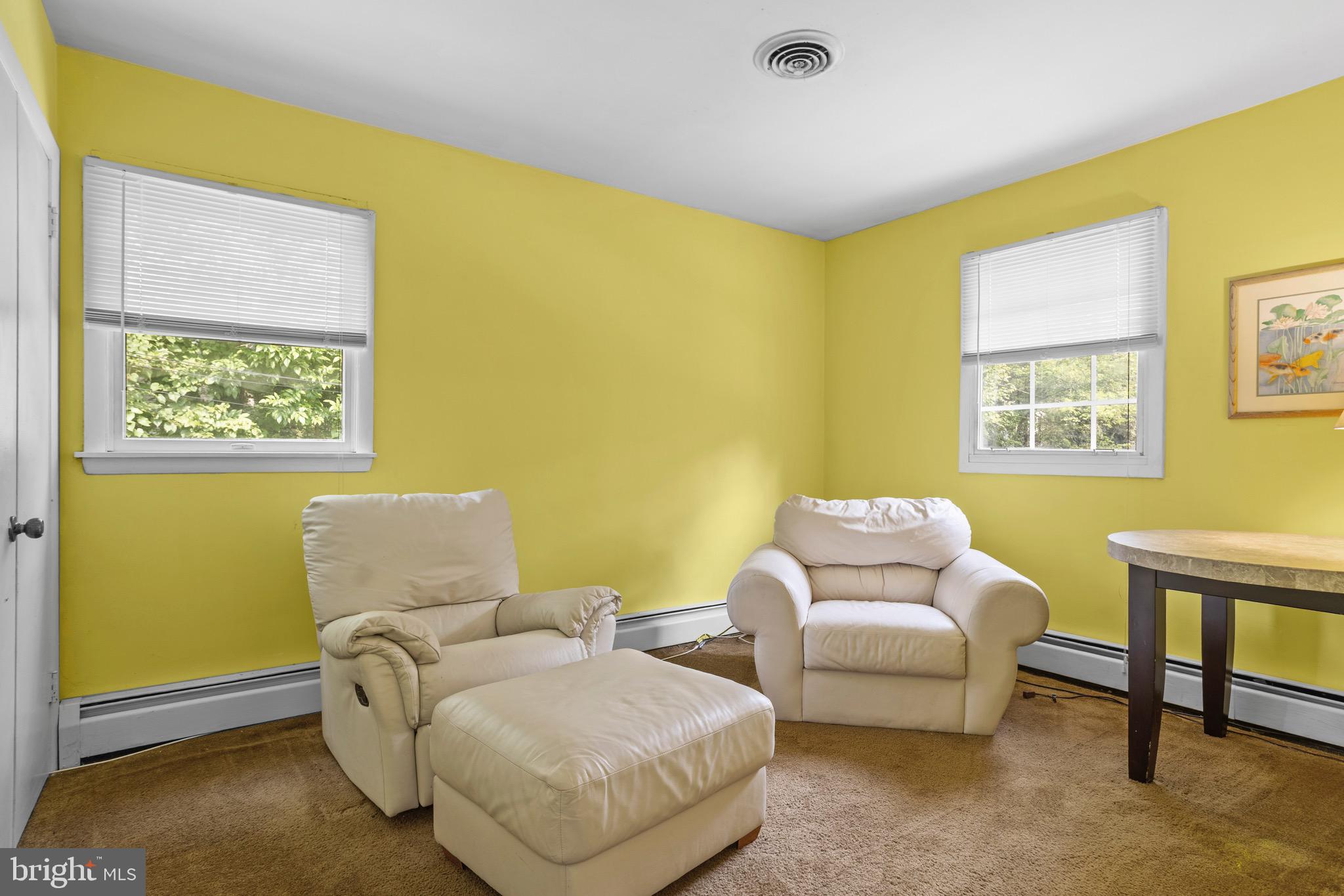 915 Ash Road Wallingford, PA 19086 - Photo 13 of 28 a living room with furniture and a window