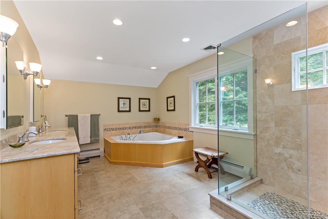 52 Old Manitou Road Garrison, NY 10524 - Photo 20 of 33 Look at this beautiful primary bath with separate shower and tub and double vanity.