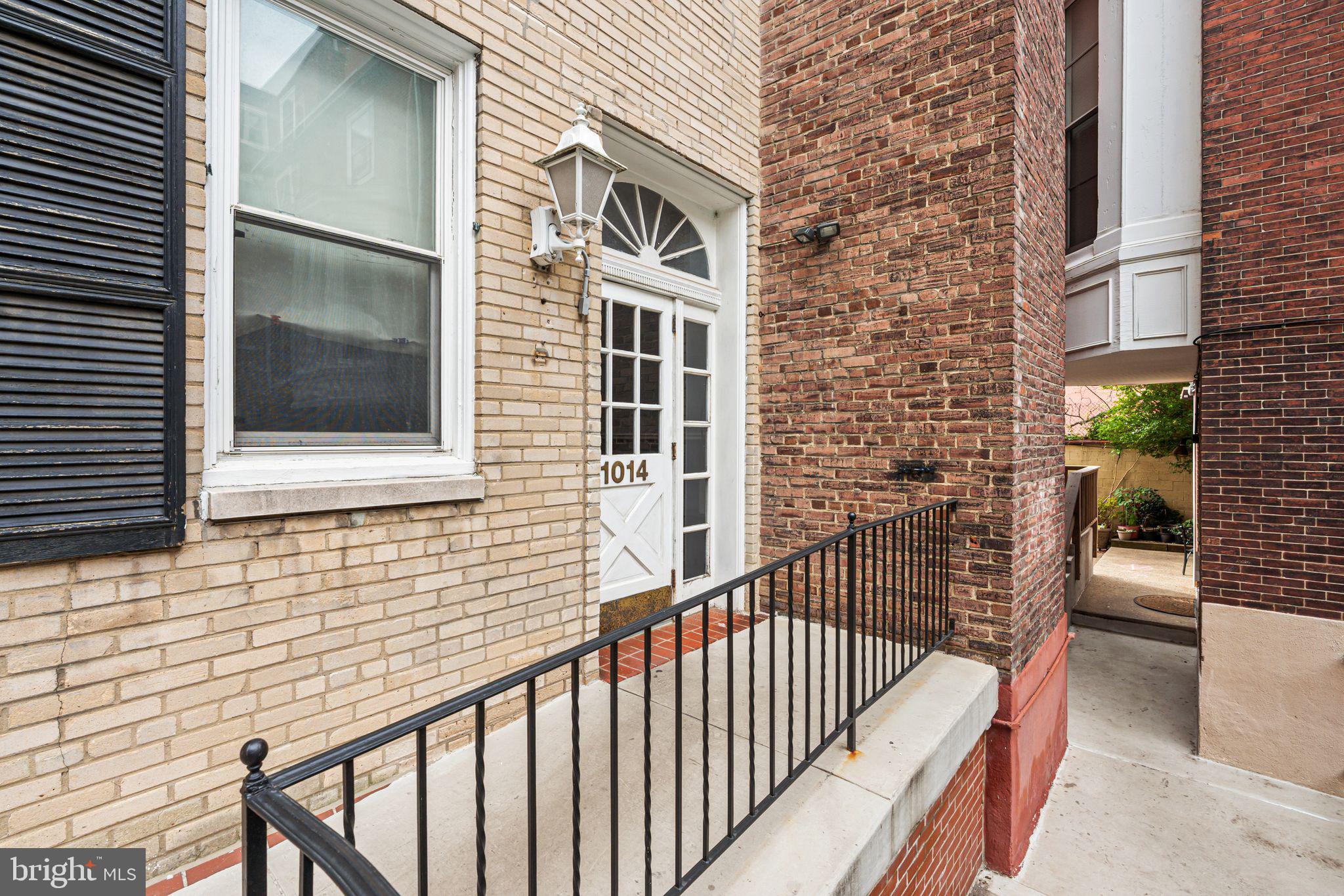 1008 Spruce Street, Unit 21 Philadelphia, PA 19107 - Photo 14 of 16 a view of a brick wall of the building