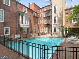 1008 Spruce Street, Unit 21 Philadelphia, PA 19107 - Photo 16 of 16 a view of a brick building from a balcony
