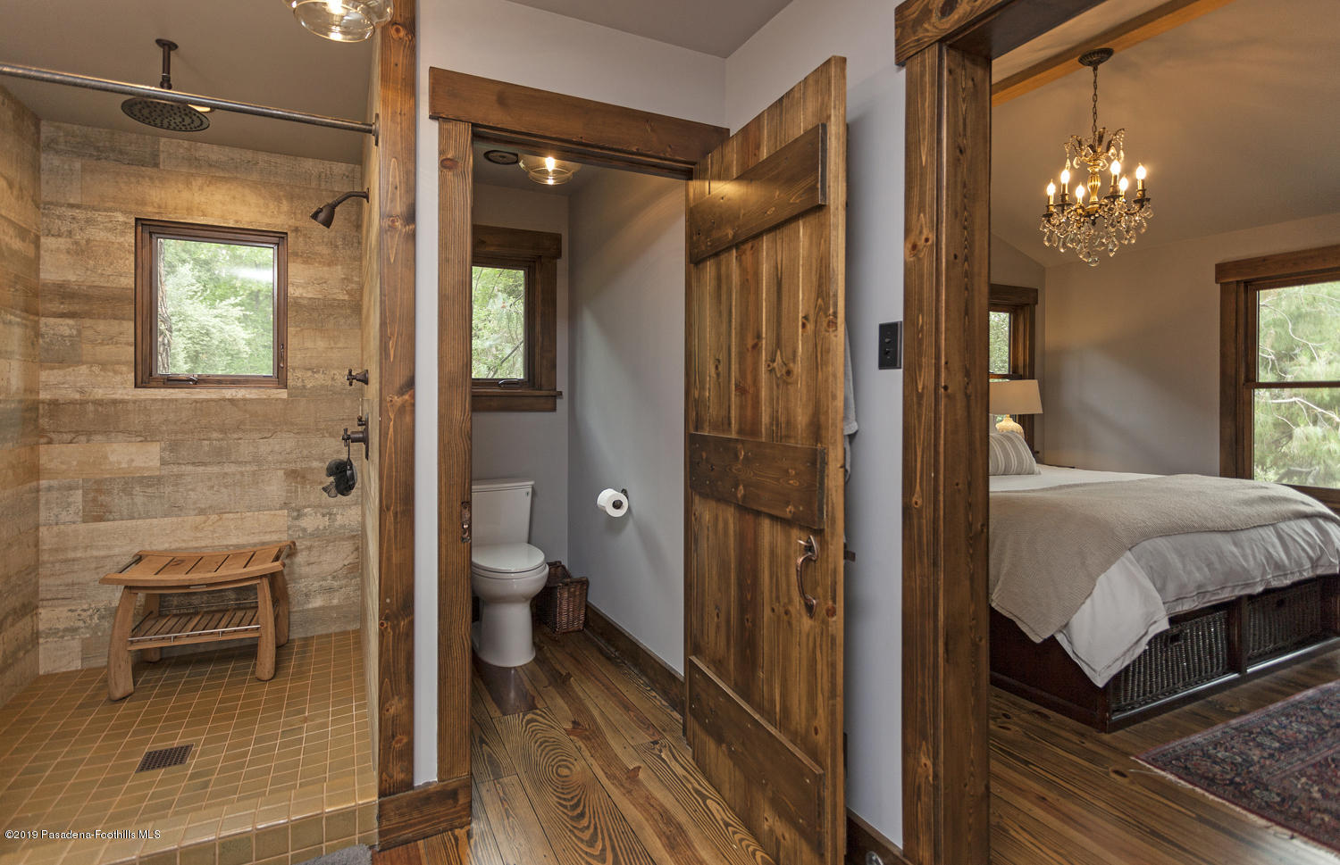 1235 Linda Ridge Road Pasadena, CA 91103 - Photo 22 of 36 a en suite bathroom with a granite countertop toilet a sink and a mirror