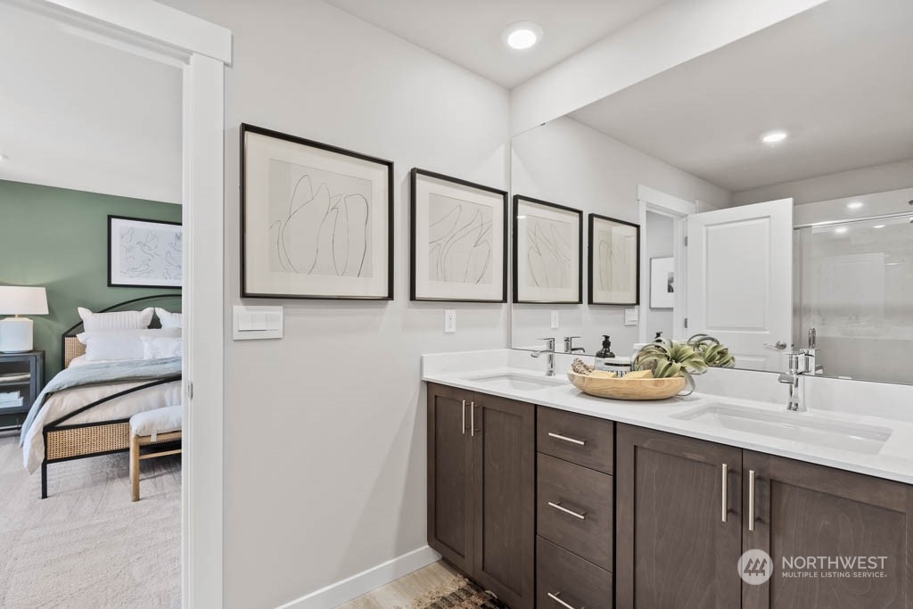 616 185th Street Southwest, Unit NCV24 Bothell, WA 98012 - Photo 14 of 25 a bathroom with a sink and a mirror