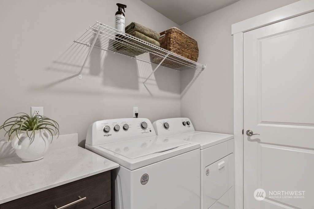 616 185th Street Southwest, Unit NCV24 Bothell, WA 98012 - Photo 19 of 25 a utility room with dryer and washer