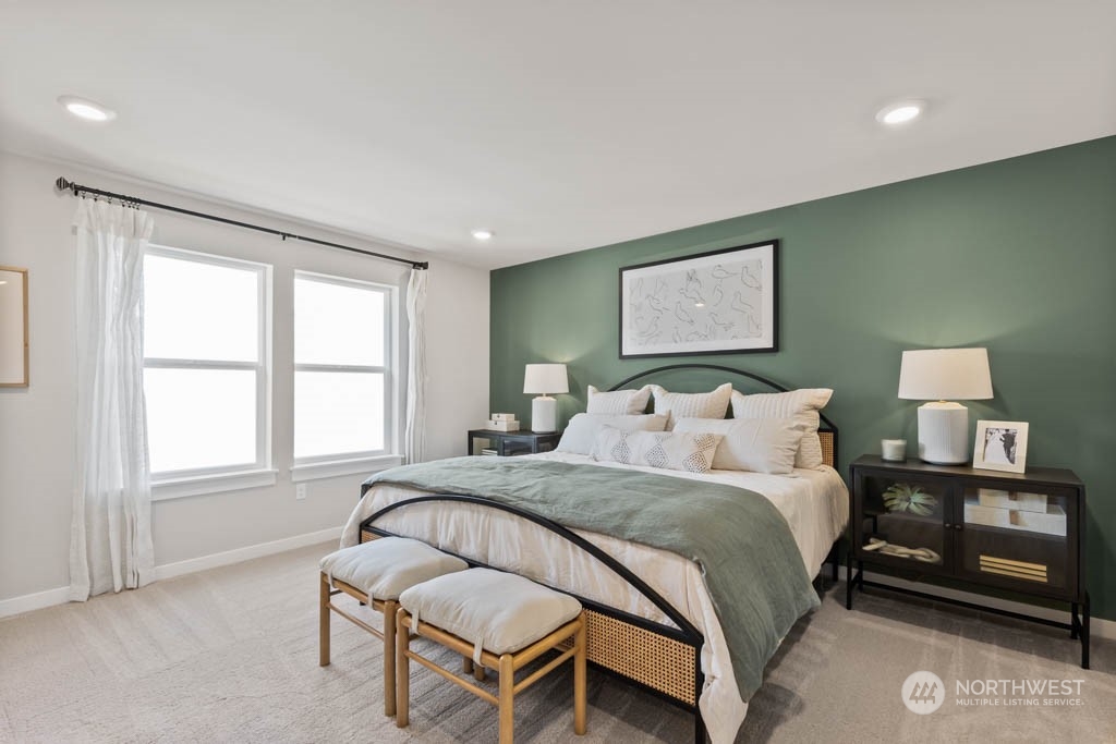 616 185th Street Southwest, Unit NCV24 Bothell, WA 98012 - Photo 20 of 25 a bedroom with a bed and a window