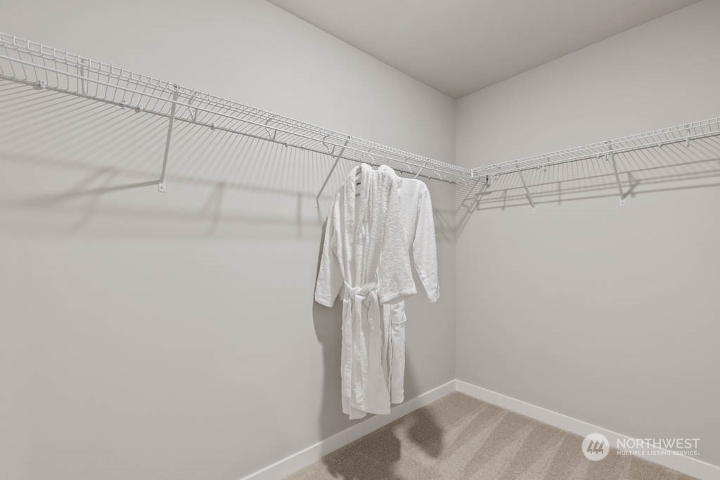 616 185th Street Southwest, Unit NCV24 Bothell, WA 98012 - Photo 23 of 25 a view of a room with racks on the wall