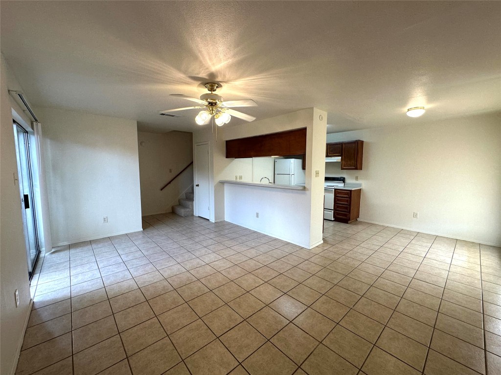 2203 Creekside Lane, Unit A Georgetown, TX 78626 - Photo 2 of 14 a view of a livingroom with a chandelier
