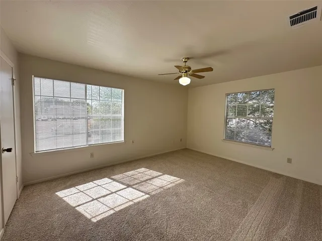 a view of a room with racks on the wall
